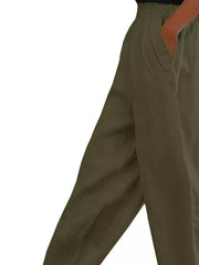 Army green maternity pants with wide legs and pockets.