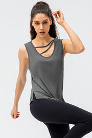 Dark gray performance tank top with strappy neckline and side slits