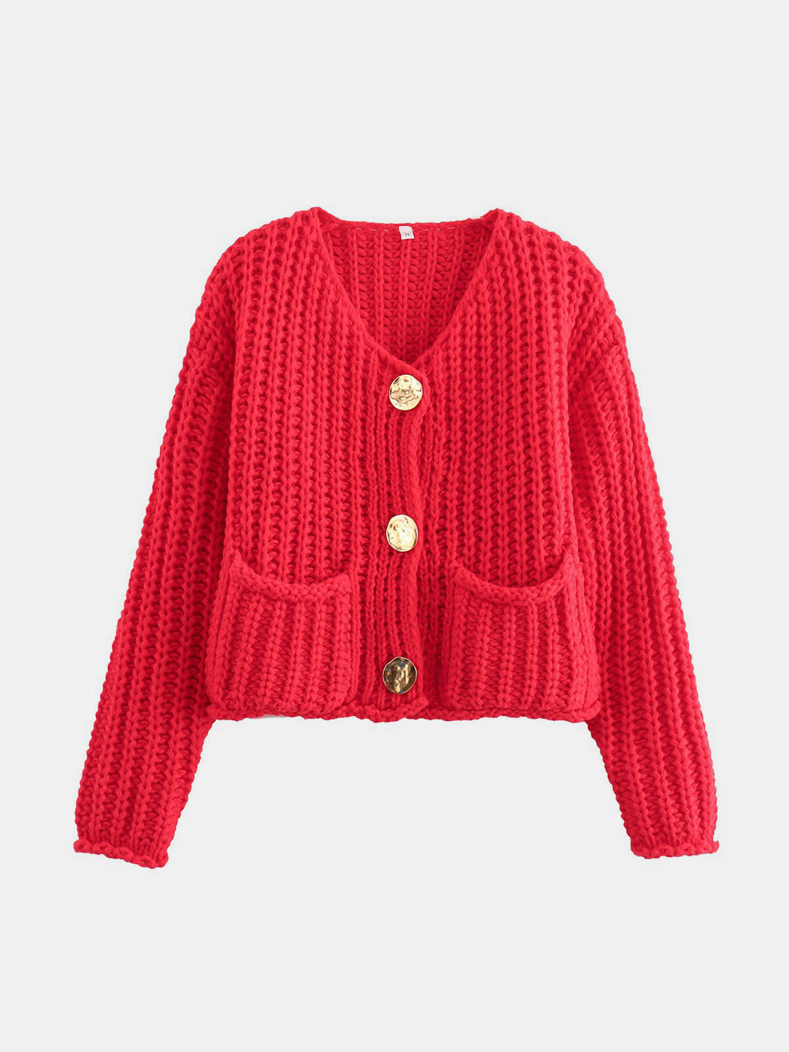 Chunky knit red cardigan with statement gold buttons and patch pockets.