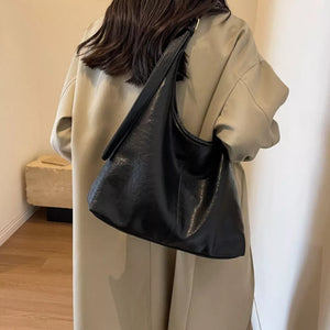 Adjustable Strap Shoulder Bag in Black, side view