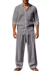 Men's gray linen blend casual two-piece set with band collar shirt and wide-leg pants.