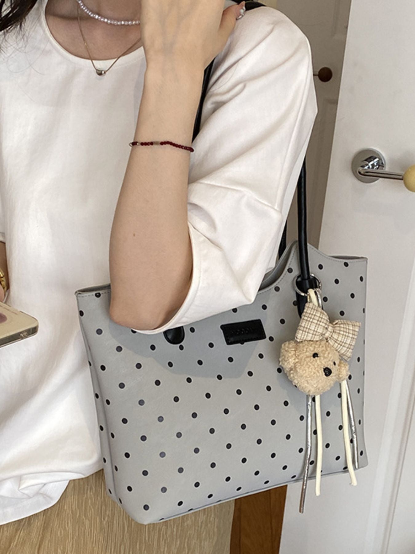 Polka Dot Shoulder Bag in Gray, editorial view