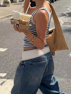 Ribbed striped scoop neck tank top with a cropped fit, worn by a woman holding coffee cups.