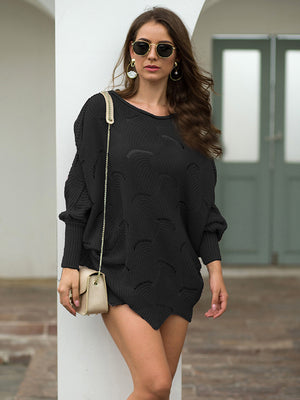 Black scalloped knit sweater with boat neck and balloon sleeves