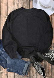Black acid wash mock neck sweatshirt with ribbed cuffs and neckline.