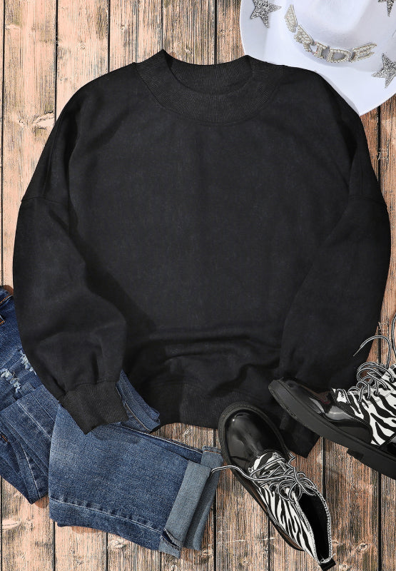 Black acid wash mock neck sweatshirt with ribbed cuffs and neckline.