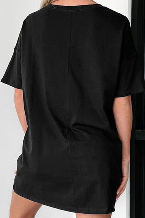 Black oversized slouch tee dress with short sleeves and a relaxed fit.