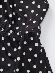 Black polka dot cami with white dots and lace trim detail.