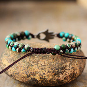 Turquoise bead bracelet with Hamsa hand charm and macrame detail
