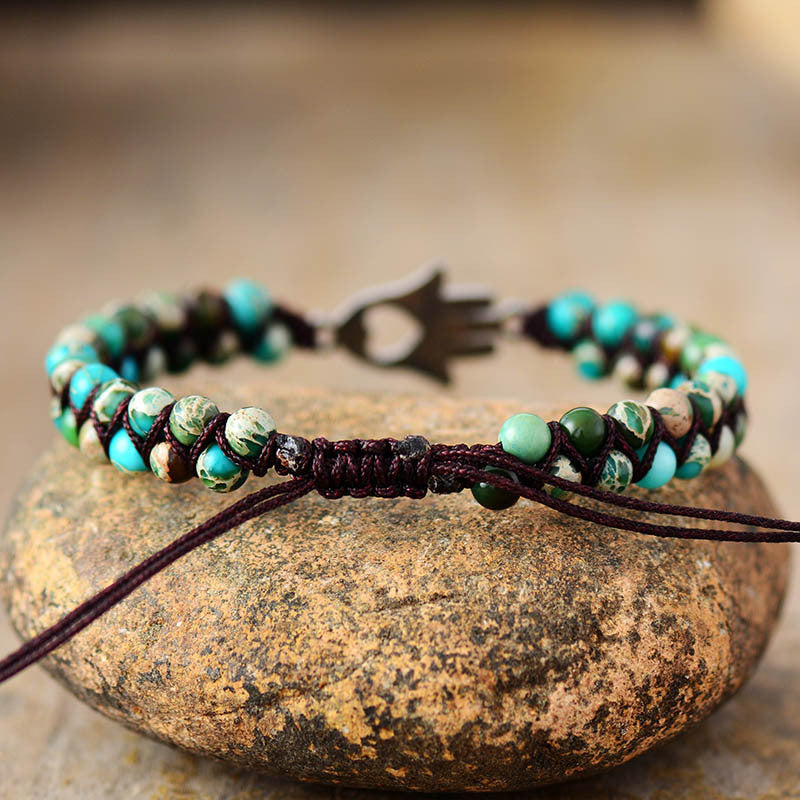 Turquoise bead bracelet with Hamsa hand charm and macrame detail