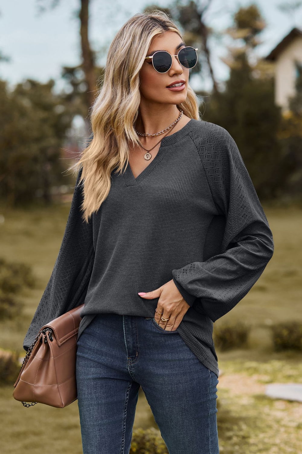 Dark Gray waffle knit raglan top with laser cut sleeves and V-neck