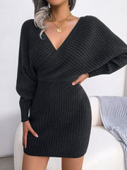 Black acrylic wrap knit bodycon mini dress with V-neck and long sleeves.