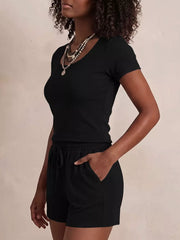 Black scoop-neck tee and drawstring shorts set with pockets, women's casual loungewear.