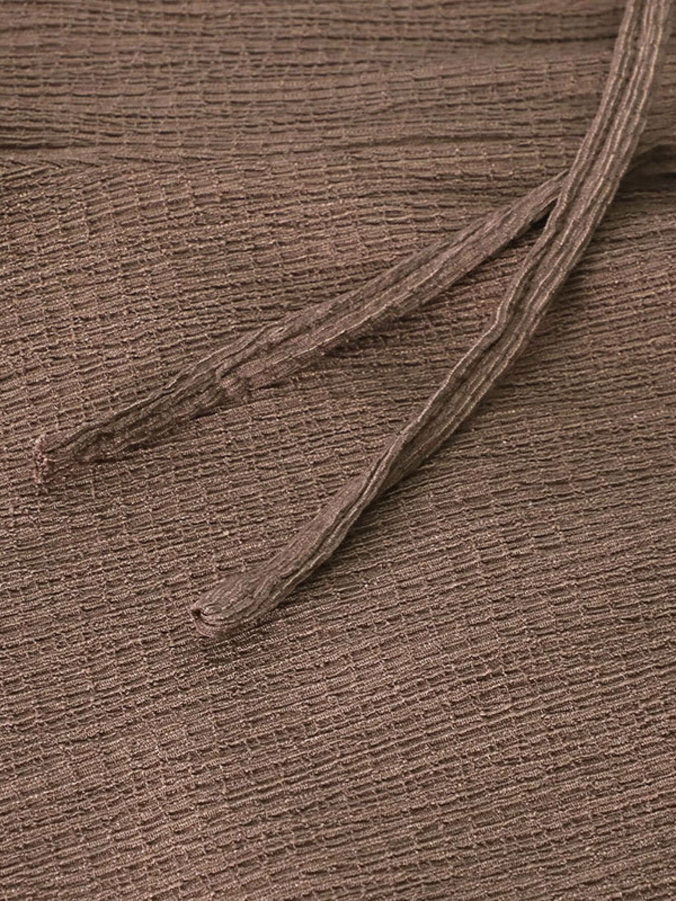 Brown crinkled wide-leg pants with drawstring detail