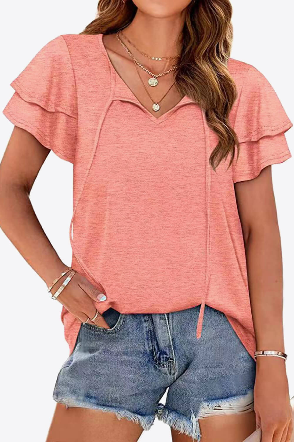 Peach tiered sleeve blouse with keyhole neckline and tie detail