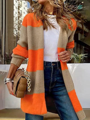 Color block knit cardigan with orange and beige stripes, open front, long sleeves.