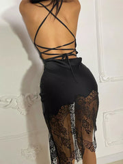 Black satin cowl neck dress with lace trim and strappy back detail