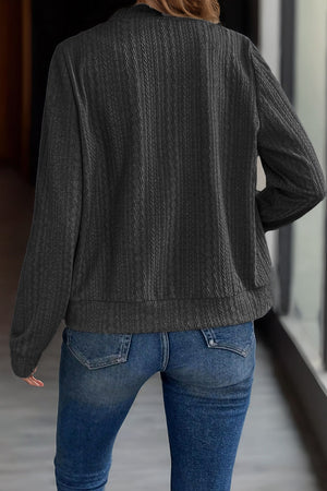 Textured ribbed bomber jacket in gray with long sleeves and a casual fit.