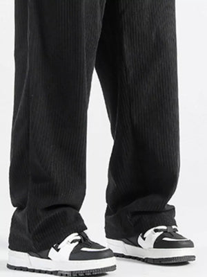 Black corduroy wide-leg sweatpants with a vertical stripe texture.
