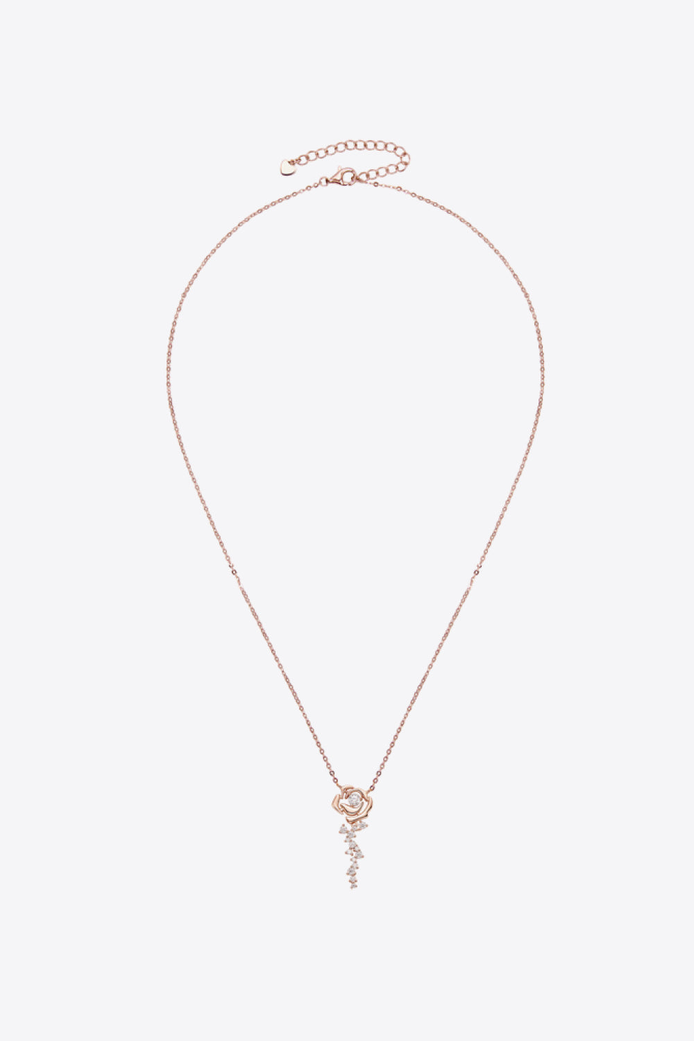 Rose gold necklace with rose pendant and cascading cubic zirconia stones.