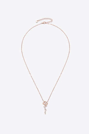 Rose gold necklace with rose pendant and cascading cubic zirconia stones.