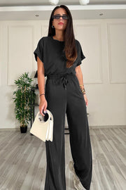 Black relaxed fit tee and wide leg pants set with drawstring waist.