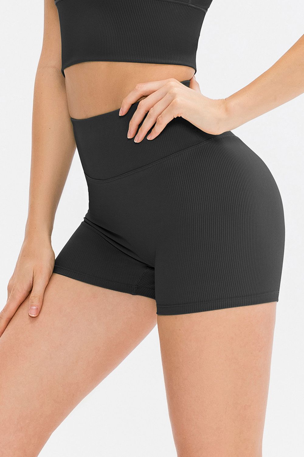 Dark Gray ribbed sculpting active shorts with a high waist and short length.