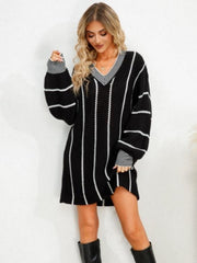 Black striped oversized sweater dress with V-neck and balloon sleeves