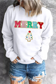 White sweatshirt with "MERRY" appliqué and Christmas tree graphic