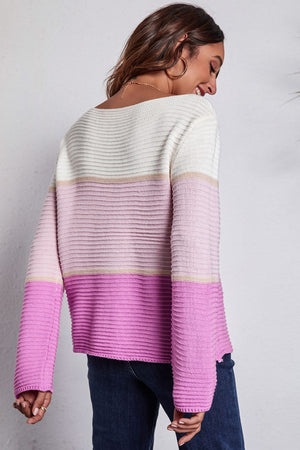Colorblock ribbed boatneck sweater in pink and white acrylic with horizontal stripes.