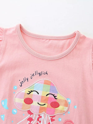 Pink cotton toddler top with embroidered smiling jellyfish and "jolly jellyfish" text.