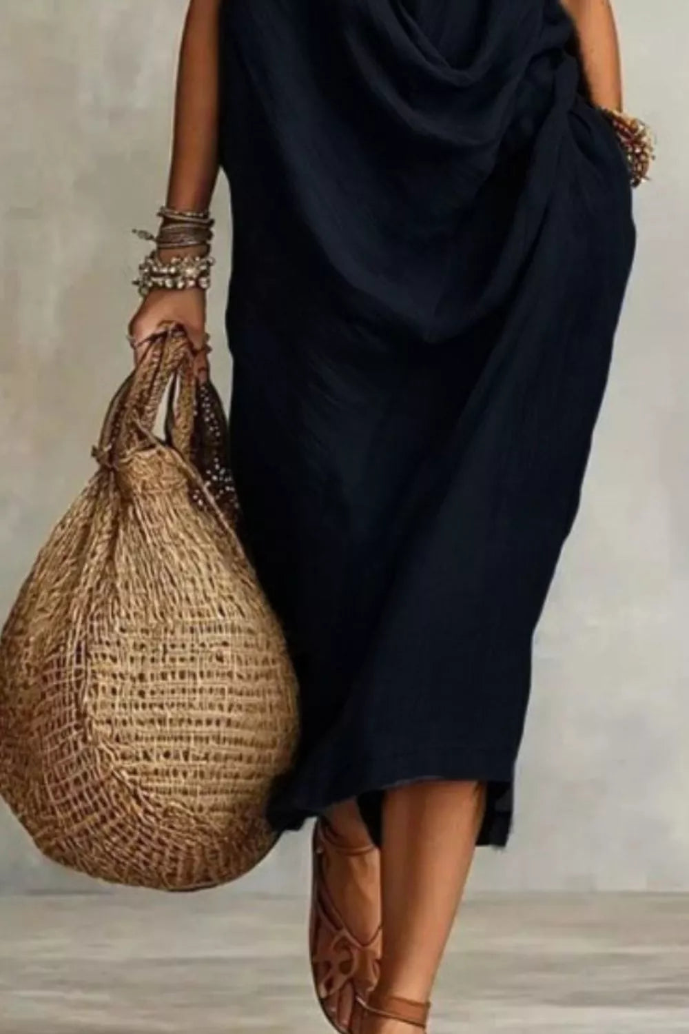 Black cowl neck midi dress with pockets and a woven tote bag.