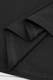 Black t-shirt with visible stitching detail on hem and sleeve.