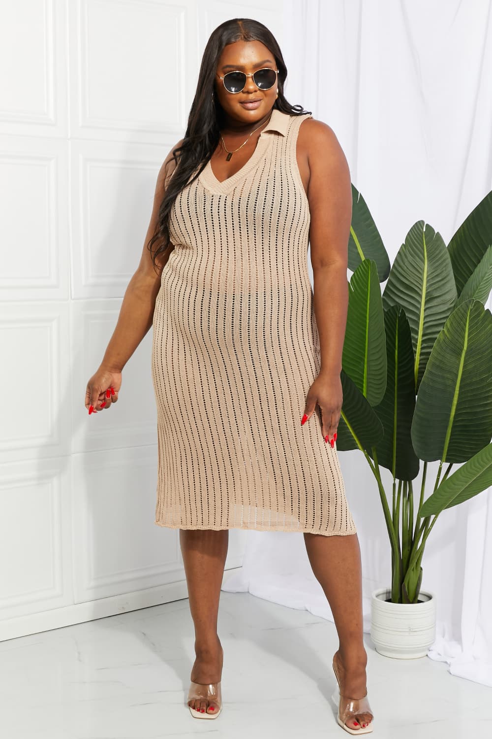 Tan open-knit collared midi cover-up with vertical stripes and a V-neck.