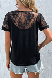 Black lace inset illusion tee with short sleeves and a scoop neckline.
