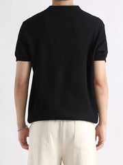 Black ribbed short sleeve polo shirt with classic collar.
