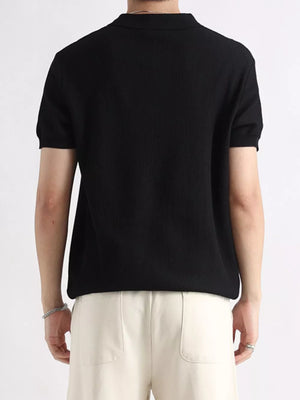Black ribbed short sleeve polo shirt with classic collar.