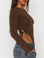 Chocolate long sleeve top with ruched side tie detail and adjustable drawstring.