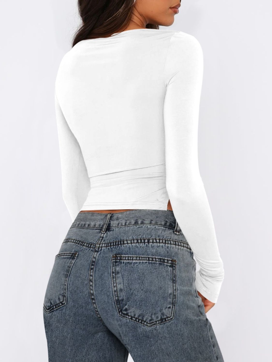 White long sleeve ruched top with adjustable side tie detail