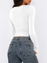 White long sleeve ruched top with adjustable side tie detail
