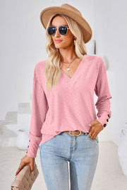 Textured V-neck blouse in Blush Pink with button cuff detail.