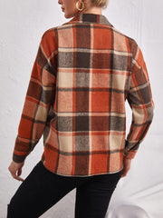 Oversized plaid shacket in ochre with button closure, long sleeves, and collar.