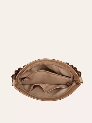 Vibrant Bohemian Hobo Tote with wooden bead handles and multiple interior pockets.