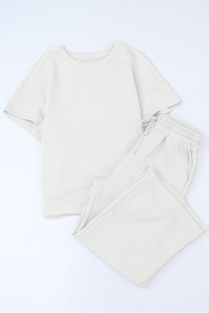 Beige textured knit tee and wide leg pants set with drawstring waist
