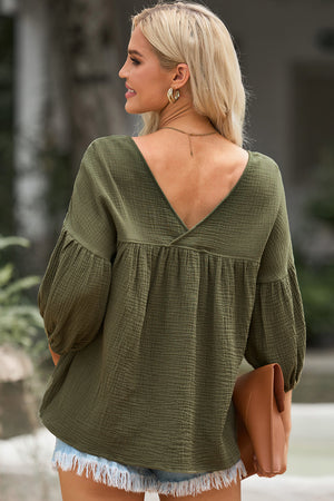 Army green textured gauze blouse with gathered sleeves and V-neckline