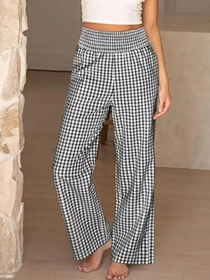 Black plaid gingham maternity pants with smocked waistband and wide legs.