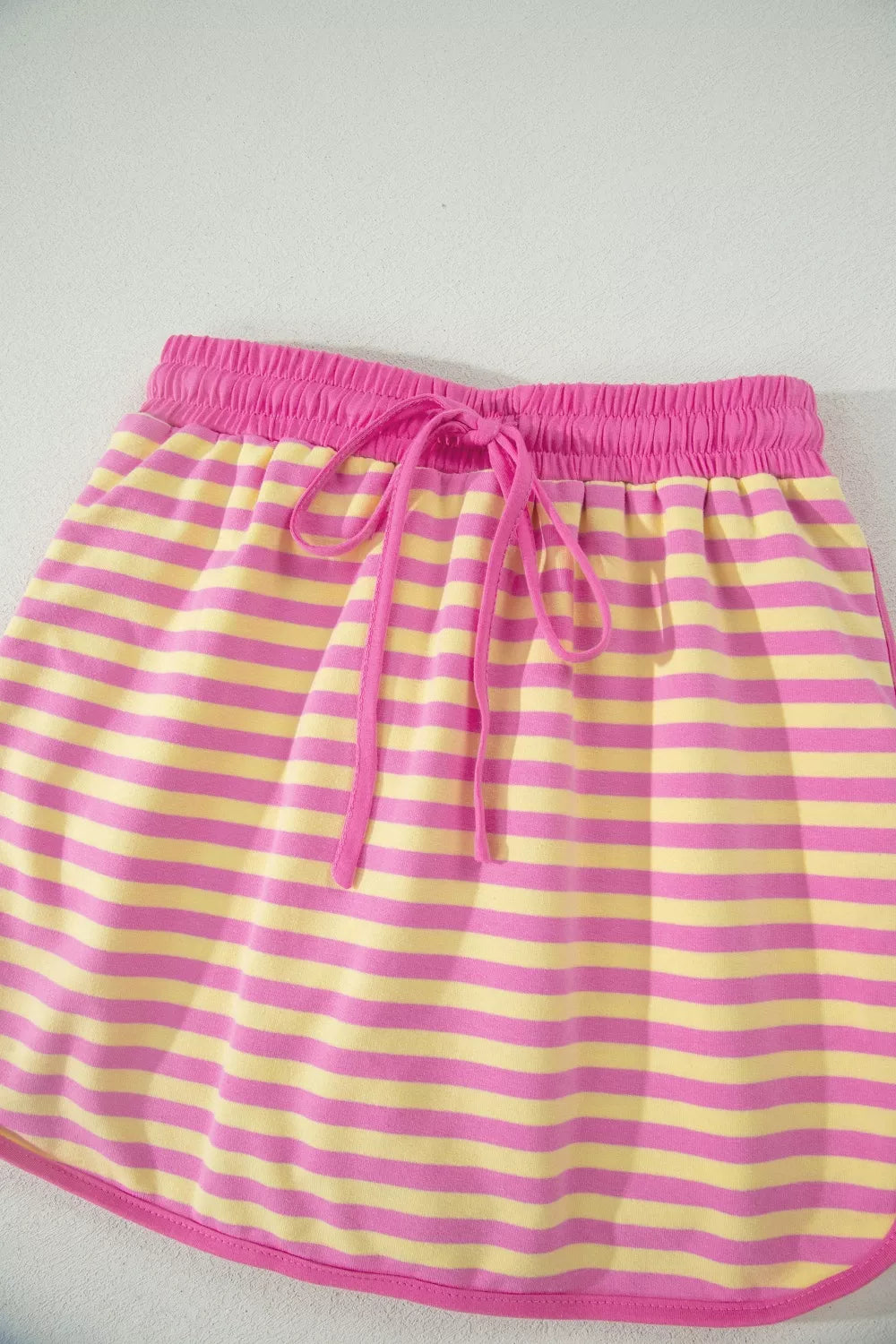 Cotton striped casual set with drawstring waist and pink trim.