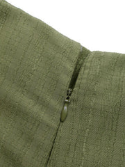 Matcha green skort with textured fabric and side zipper detail