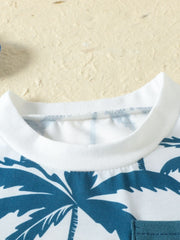 Baby crew neck tee with blue palm tree print on white cotton blend fabric.
