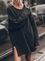 Oversized open-knit sweater dress in black with crew neck and side slits.
